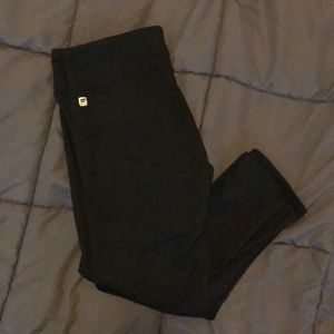 Black Fabletics mid-rise PowerHold capri leggings